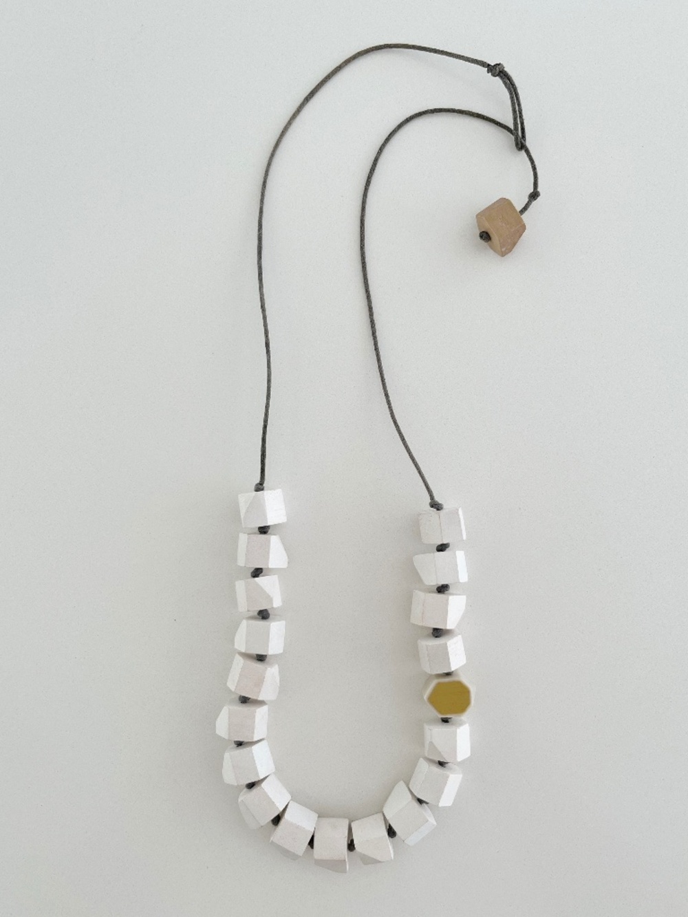 ELK the Label Asymmetrical Wood Geometric Statement Necklace – White/Mustard
